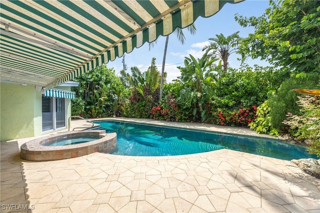 1135 7th St S, Naples, FL 34102 - view of pool featuring a patio and a pool with connected hot tub