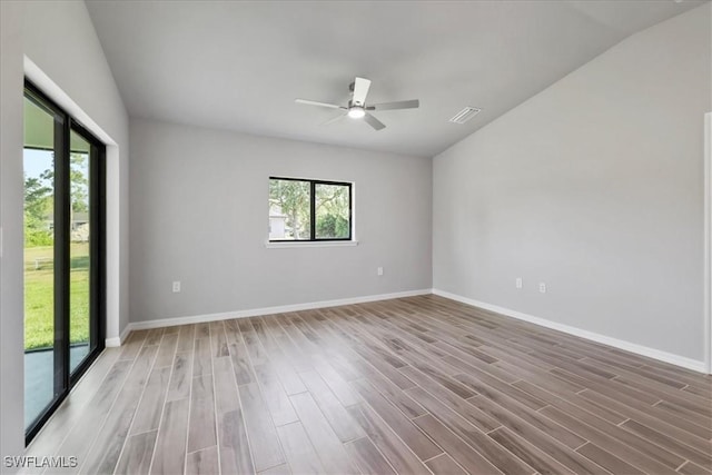 3225 58th St W, Lehigh Acres, FL 33971 - unfurnished room featuring ceiling fan, light wood-style floors, visible vents, and plenty of natural light