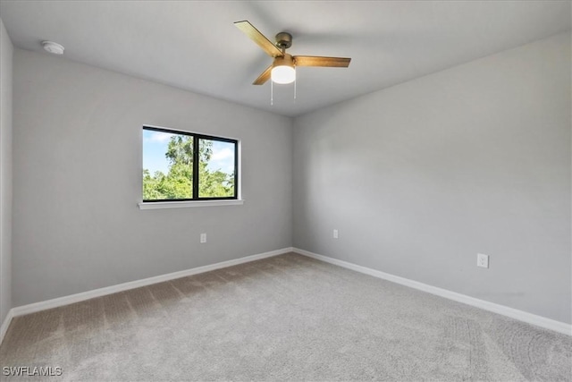 3225 58th St W, Lehigh Acres, FL 33971 - empty room with ceiling fan, carpet floors, and baseboards