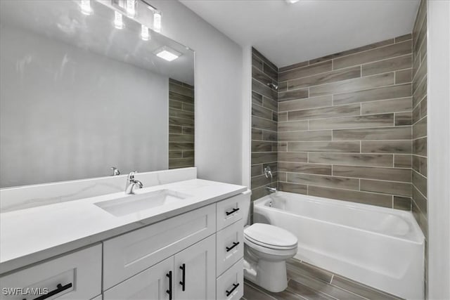 3225 58th St W, Lehigh Acres, FL 33971 - full bathroom featuring toilet, vanity, shower / washtub combination, and wood tiled floor