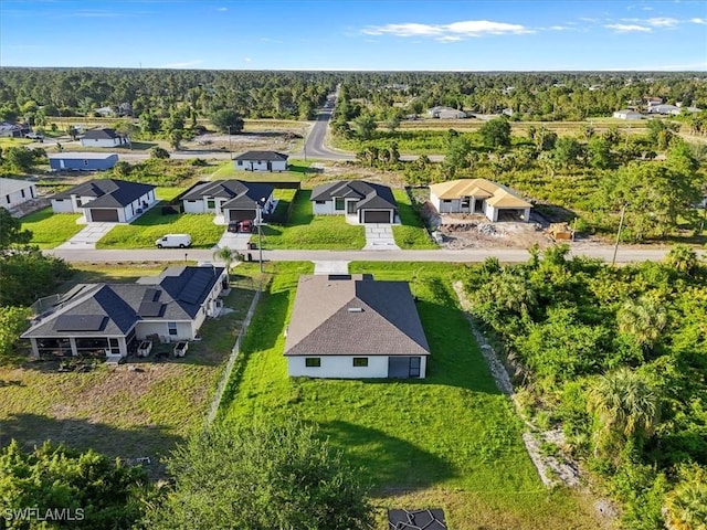 3225 58th St W, Lehigh Acres, FL 33971 - birds eye view of property with a residential view