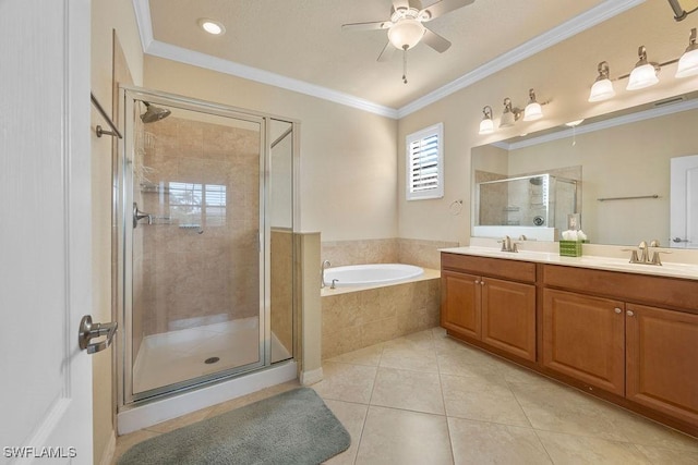 full bath featuring a shower stall, a bath, tile patterned floors, a ceiling fan, and double vanity