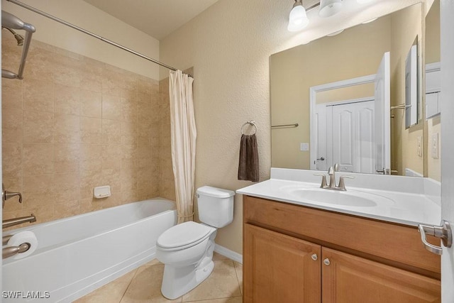 full bathroom featuring tile patterned flooring, toilet, shower / tub combo, vanity, and baseboards