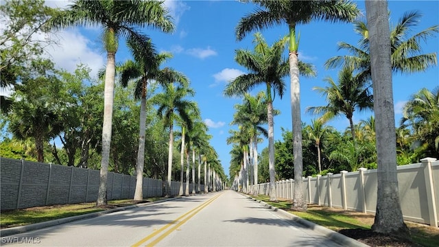 view of road with curbs