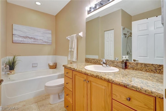 bathroom featuring tile patterned floors, a bath, vanity, walk in shower, and toilet