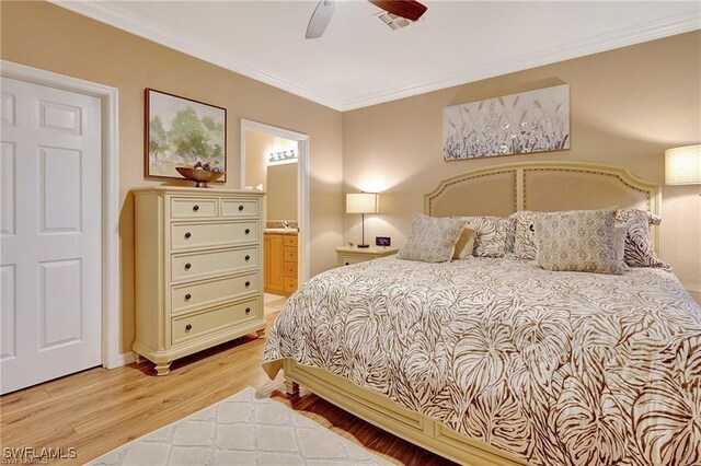 bedroom featuring visible vents, light wood-style floors, ceiling fan, crown molding, and connected bathroom