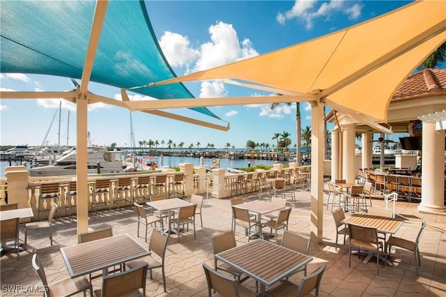 view of patio featuring a water view