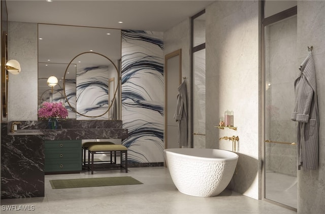 full bathroom with a soaking tub, a shower stall, and vanity