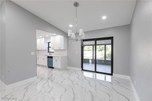 242 Ground Dove Cir, Lehigh Acres, FL 33936 - unfurnished dining area featuring baseboards, a chandelier, light marble finish flooring, recessed lighting, and a sink