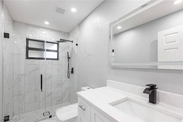 242 Ground Dove Cir, Lehigh Acres, FL 33936 - full bathroom featuring recessed lighting, a marble finish shower, and vanity