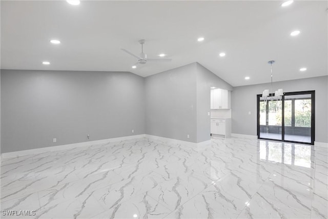 242 Ground Dove Cir, Lehigh Acres, FL 33936 - spare room with recessed lighting, ceiling fan, baseboards, light marble finish floors, and vaulted ceiling