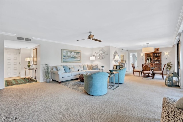 2400 Gulf Shore Blvd N Unit 203, Naples, FL 34103 - carpeted living room with ornamental molding, ceiling fan, and baseboards