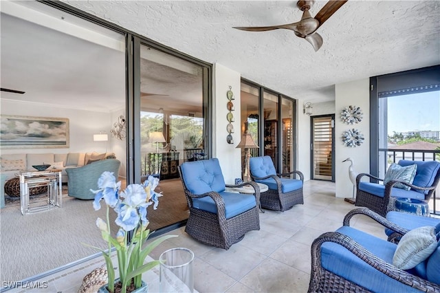 2400 Gulf Shore Blvd N Unit 203, Naples, FL 34103 - view of patio / terrace featuring outdoor lounge area and a ceiling fan