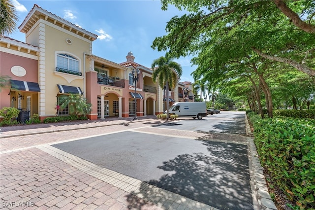 20310 Estero Gardens Cir Unit 102, Estero, FL 33928 - exterior space featuring curbs and sidewalks