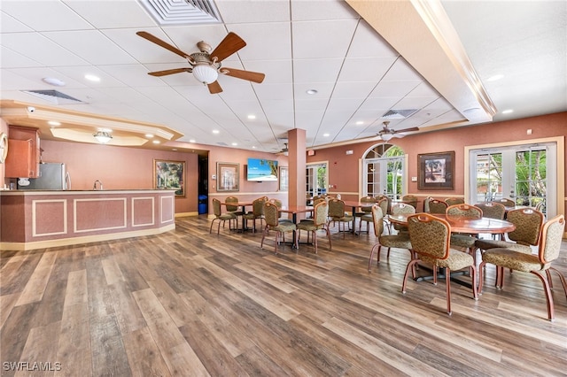 20310 Estero Gardens Cir Unit 102, Estero, FL 33928 - dining room featuring wood finished floors, visible vents, and ceiling fan