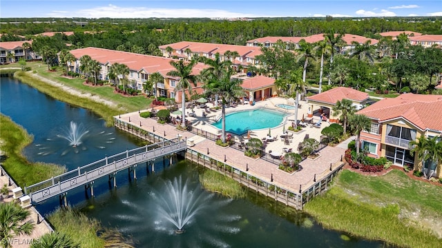 20310 Estero Gardens Cir Unit 102, Estero, FL 33928 - drone / aerial view featuring a residential view and a water view