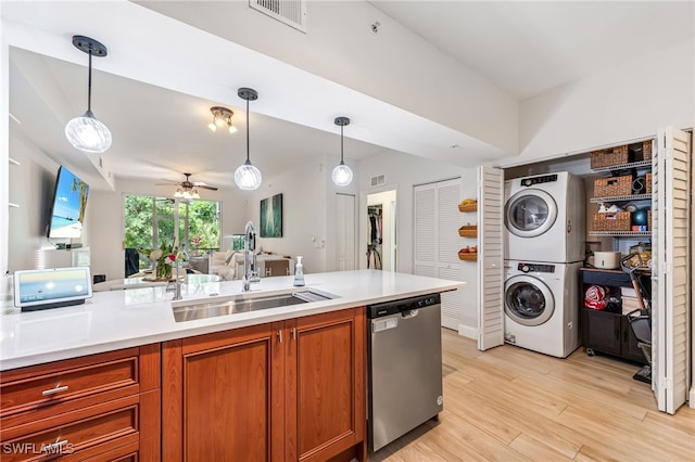 20310 Estero Gardens Cir Unit 102, Estero, FL 33928 - kitchen featuring a ceiling fan, a sink, stacked washer / dryer, dishwasher, and visible vents