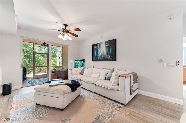 20310 Estero Gardens Cir Unit 102, Estero, FL 33928 - living area featuring wood finished floors, baseboards, and ceiling fan