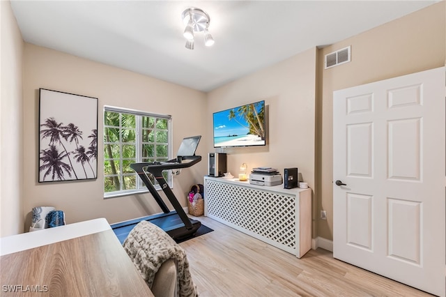 20310 Estero Gardens Cir Unit 102, Estero, FL 33928 - workout room with light wood finished floors and visible vents