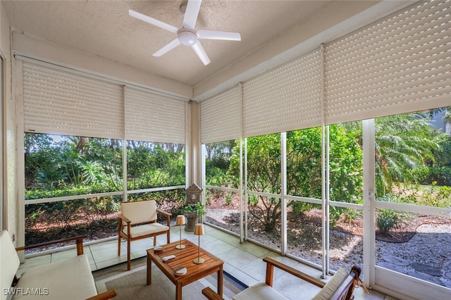 sunroom / solarium with ceiling fan and plenty of natural light