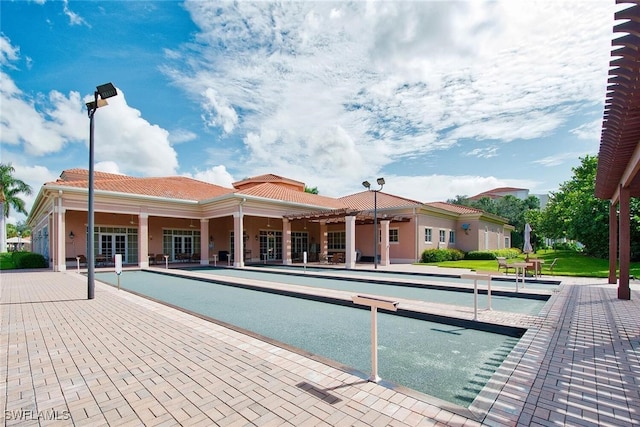 view of swimming pool featuring a game area