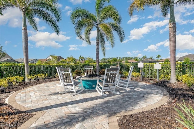 view of patio featuring fence