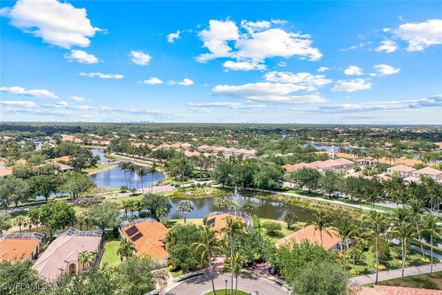 2783 Island Pond Ln, Naples, FL 34119 - drone / aerial view featuring a residential view and a water view