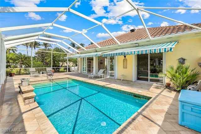 2783 Island Pond Ln, Naples, FL 34119 - outdoor pool with a patio area and a lanai