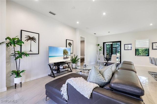 1990 47th Ave NE, Naples, FL 34120 - living area with baseboards, visible vents, and recessed lighting