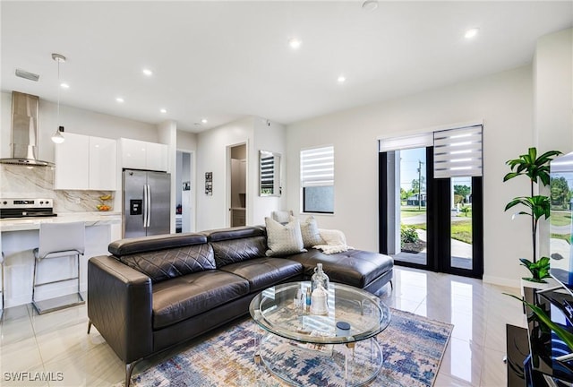 1990 47th Ave NE, Naples, FL 34120 - living room with recessed lighting and visible vents