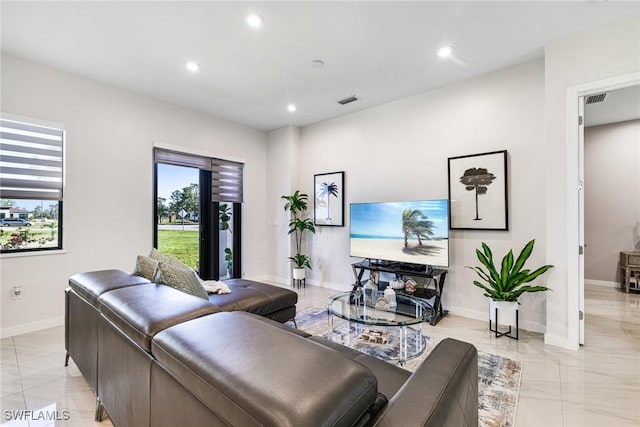 1990 47th Ave NE, Naples, FL 34120 - living room featuring recessed lighting, visible vents, and marble finish floor