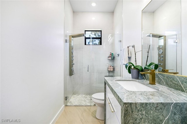 1990 47th Ave NE, Naples, FL 34120 - full bathroom with toilet, vanity, and a stall shower