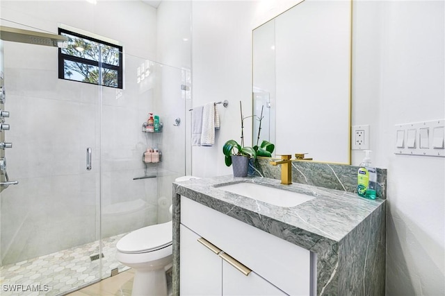 1990 47th Ave NE, Naples, FL 34120 - bathroom with vanity, a shower stall, and toilet