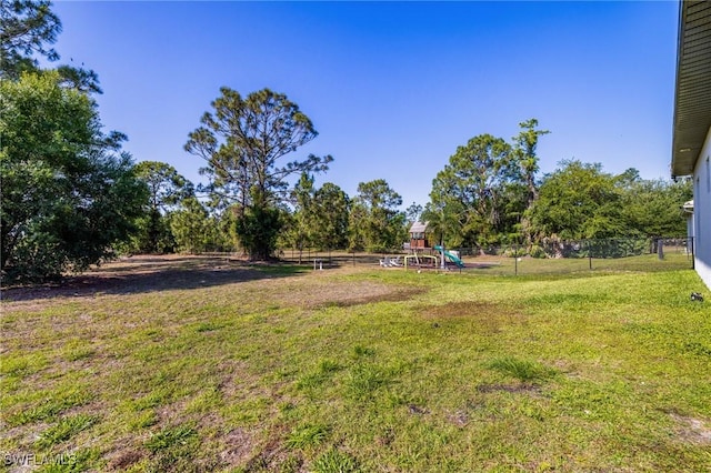 1990 47th Ave NE, Naples, FL 34120 - view of yard featuring fence and a playground