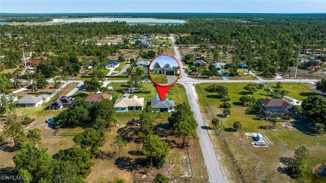 1990 47th Ave NE, Naples, FL 34120 - drone / aerial view featuring a view of trees