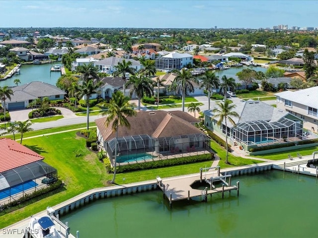 aerial view featuring a residential view and a water view