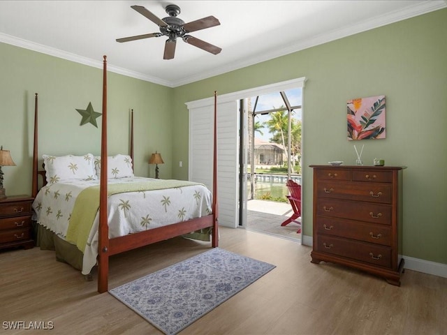bedroom with access to exterior, baseboards, light wood-style floors, ceiling fan, and ornamental molding