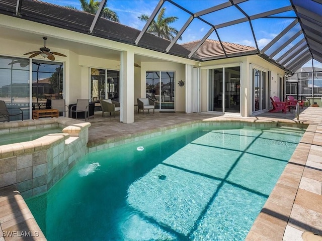 exterior space with stucco siding, a ceiling fan, a patio, and an outdoor hangout area