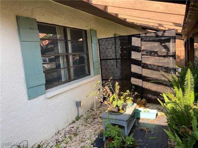 191 Round Key Cir Unit D2, Naples, FL 34112 - exterior view of stucco siding