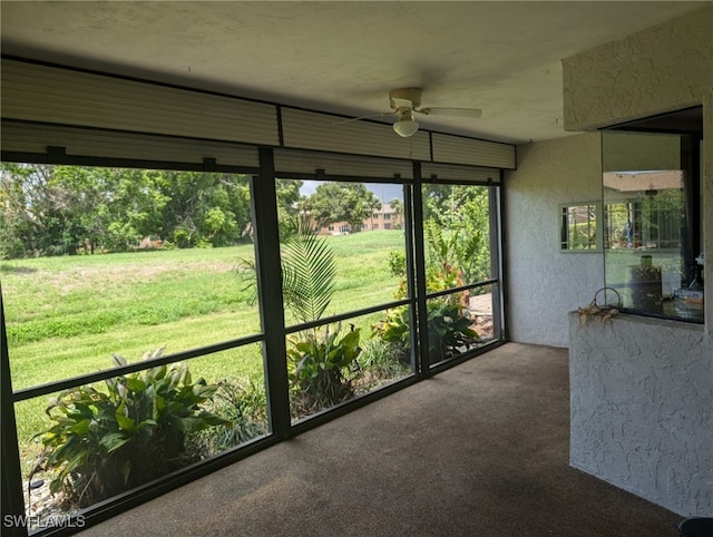 191 Round Key Cir Unit D2, Naples, FL 34112 - unfurnished sunroom featuring ceiling fan