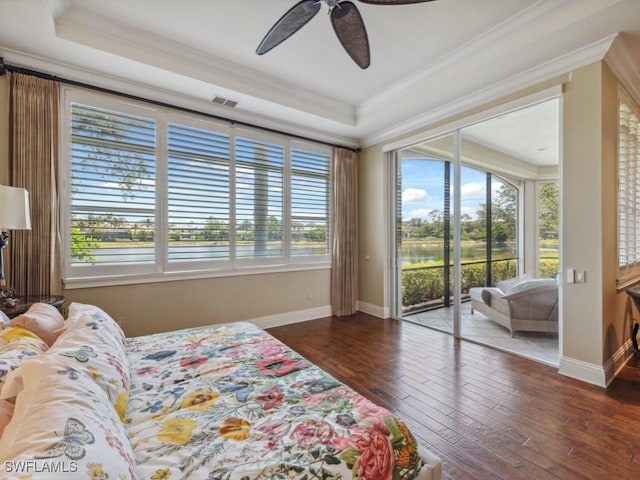 28561 Calabria Ct Unit 102, Naples, FL 34110 - bedroom with access to outside, multiple windows, crown molding, wood-type flooring, and a tray ceiling