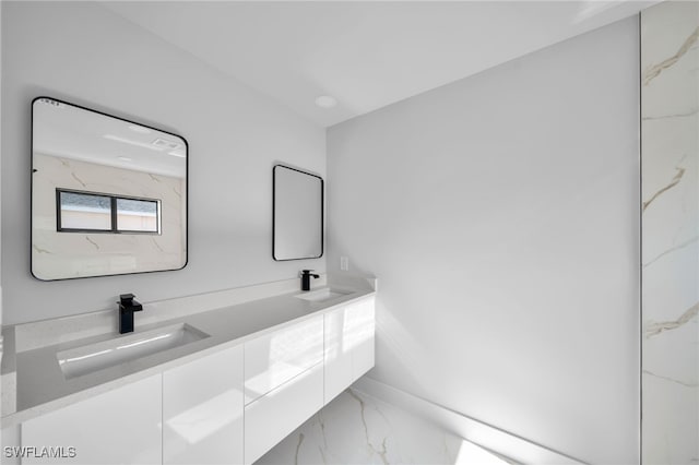 2603 36th St SW, Lehigh Acres, FL 33976 - bathroom with marble finish floors and double vanity