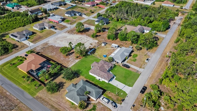 2603 36th St SW, Lehigh Acres, FL 33976 - aerial view of property and surrounding area with nearby suburban area