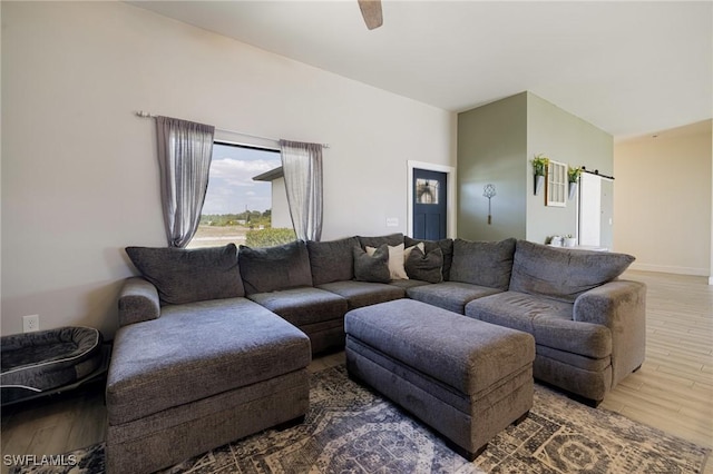 7717 16th Ter, Labelle, FL 33935 - living room featuring wood finished floors and baseboards