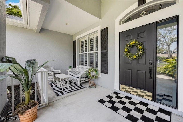 1518 Mcgregor Reserve Dr, Fort Myers, FL 33901 - property entrance with covered porch and stucco siding