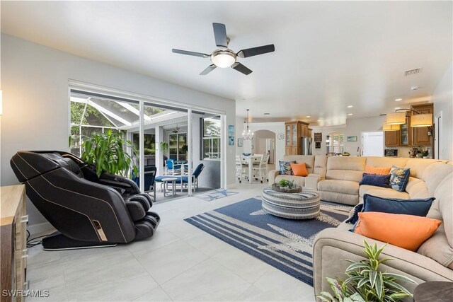 1518 Mcgregor Reserve Dr, Fort Myers, FL 33901 - living room featuring ceiling fan, arched walkways, light tile patterned floors, and recessed lighting