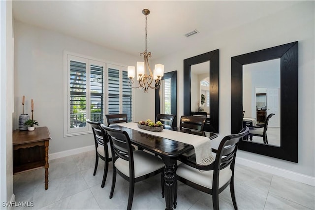 1518 Mcgregor Reserve Dr, Fort Myers, FL 33901 - dining space with a chandelier and light tile patterned floors