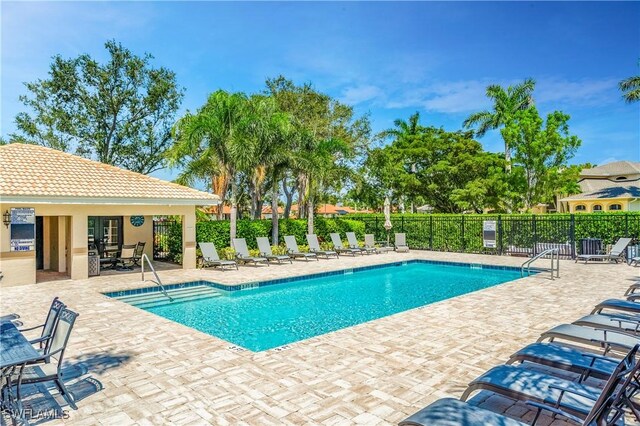1518 Mcgregor Reserve Dr, Fort Myers, FL 33901 - community pool featuring a patio
