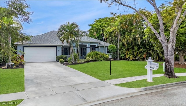 1518 Mcgregor Reserve Dr, Fort Myers, FL 33901 - single story home featuring an attached garage, a front lawn, concrete driveway, and stucco siding