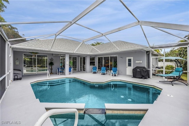 1518 Mcgregor Reserve Dr, Fort Myers, FL 33901 - view of swimming pool with a patio, grilling area, a ceiling fan, a pool with connected hot tub, and a lanai
